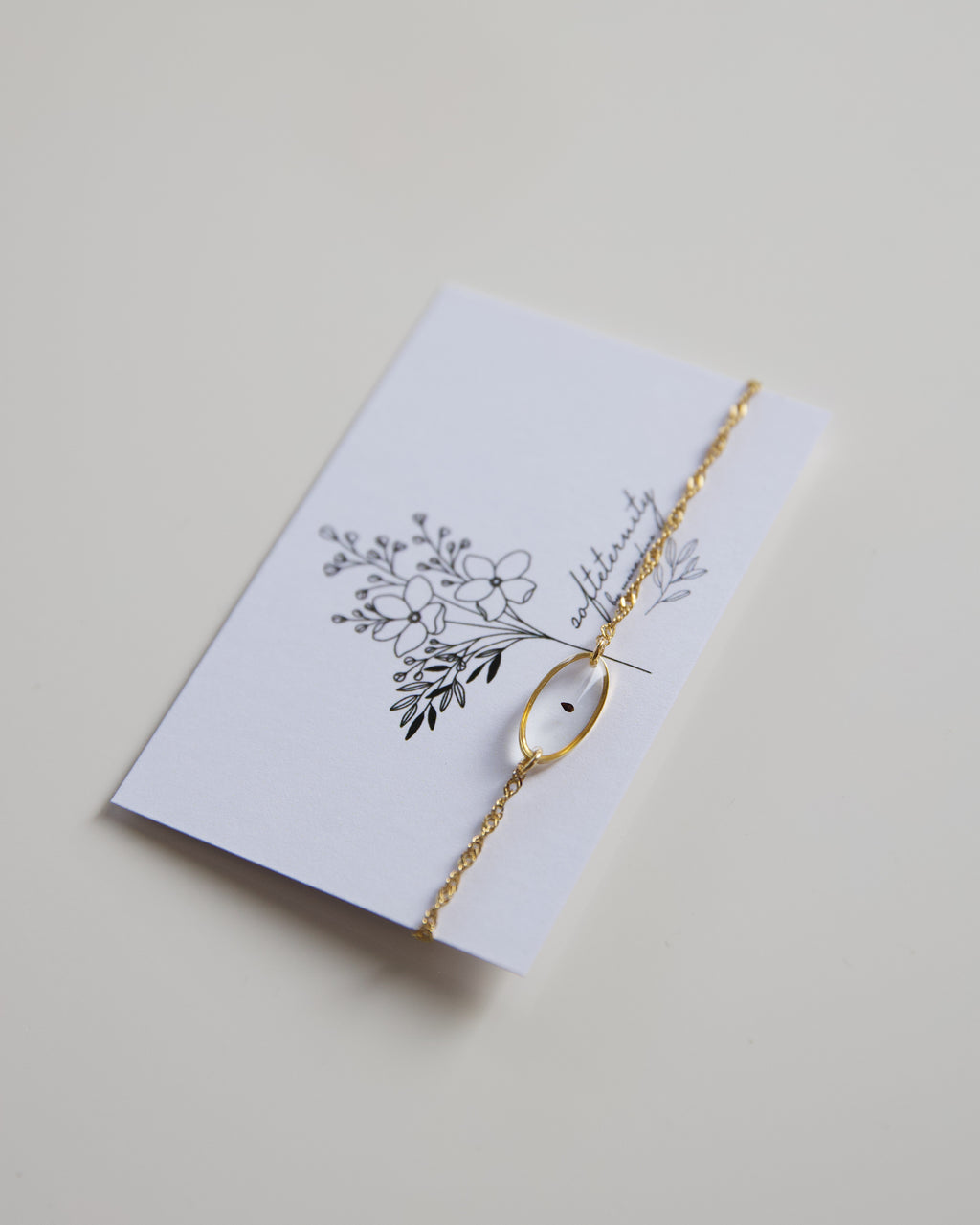 Armband “Sternenkind Oval” mit echtem Vergissmeinnicht, Gold